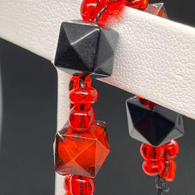 ORANGE, BLACK STRING BRACELET GLASS BEADS