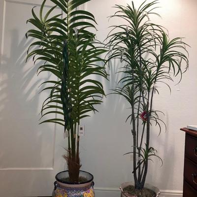 Pair of planters with faux palm trees