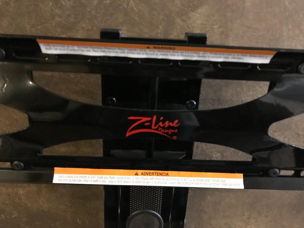 Z-line Design 3-In-1 TV stand with Integrated Mount | EstateSales.org