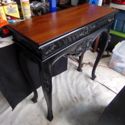Black sofa/hall table.
