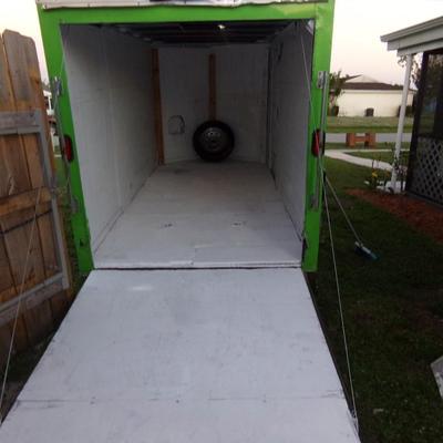 2010 Trans Haul Inc. 6' x 12' Enclosed V-Nose Cargo Trailer.