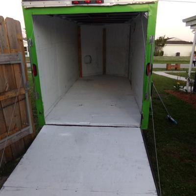 2010 Trans Haul Inc. 6' x 12' Enclosed V-Nose Cargo Trailer.