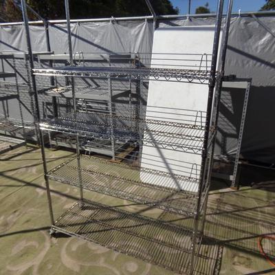 Metal Seville Classics Bakers Rack with Locking Wheels and 4 Extra Shelves.