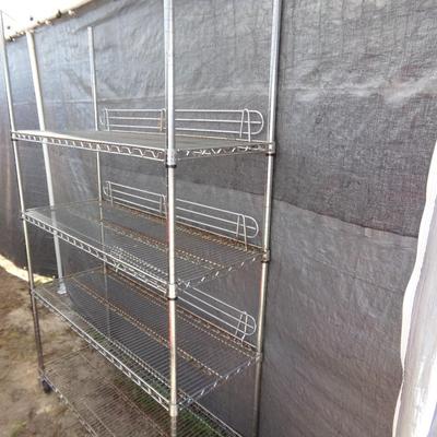 Metal Seville Classics Bakers Rack with Locking Wheels and 4 Extra Shelves.