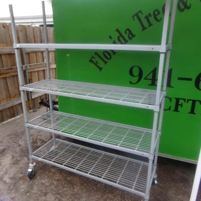 Amco Metal Backers Rack with Large Locking Wheels.