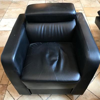Black Swivel chair with movable head rest