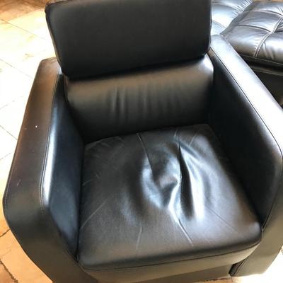 Black Swivel chair with movable head rest