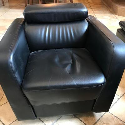 Black Swivel chair with movable head rest