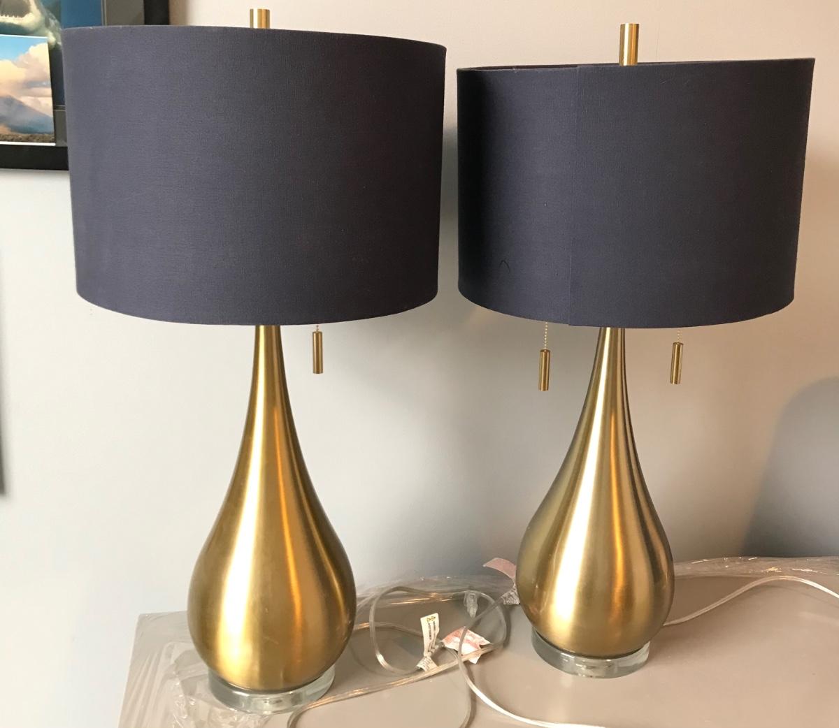 Pair of brass colored teardrop table lamps