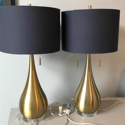 Pair of brass colored teardrop table lamps