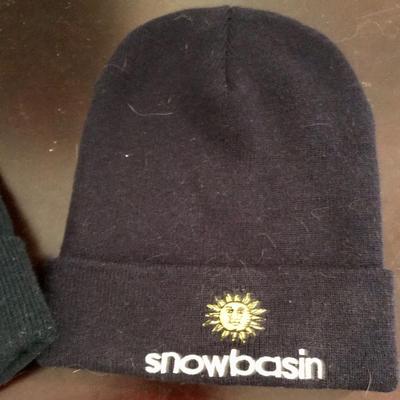 2 black knit hats