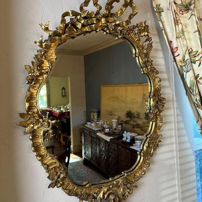 LOT# 54 ANTIQUE CARVED AND GILT WALL MIRROR