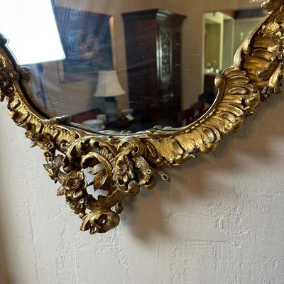 LOT# 54 ANTIQUE CARVED AND GILT WALL MIRROR