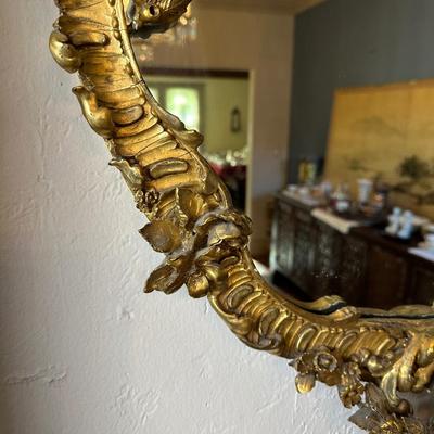 LOT# 54 ANTIQUE CARVED AND GILT WALL MIRROR