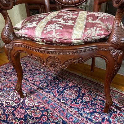 LOT 11. PAIR OF ORNATELY CARVED RED TEAK ARM CHAIRS