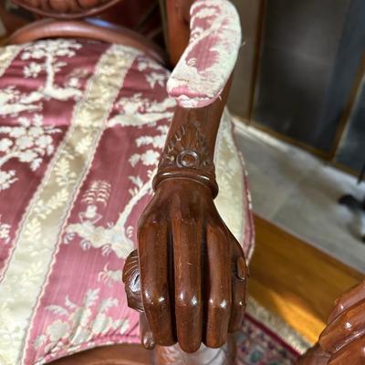 LOT 11. PAIR OF ORNATELY CARVED RED TEAK ARM CHAIRS