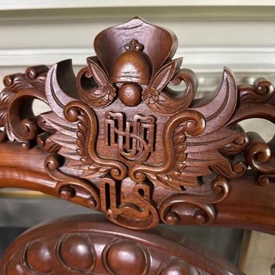 LOT 11. PAIR OF ORNATELY CARVED RED TEAK ARM CHAIRS