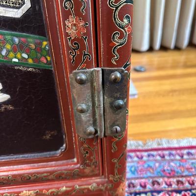 LOT #12 PAIR OF ANTIQUE RED LAQUER CABINETS WITH HIGHLY DECORATED PANELS