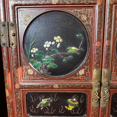 LOT #12 PAIR OF ANTIQUE RED LAQUER CABINETS WITH HIGHLY DECORATED PANELS