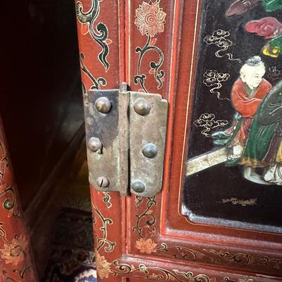 LOT #12 PAIR OF ANTIQUE RED LAQUER CABINETS WITH HIGHLY DECORATED PANELS