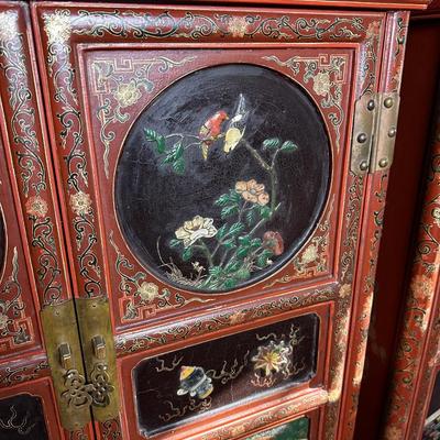 LOT #12 PAIR OF ANTIQUE RED LAQUER CABINETS WITH HIGHLY DECORATED PANELS