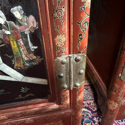LOT #12 PAIR OF ANTIQUE RED LAQUER CABINETS WITH HIGHLY DECORATED PANELS