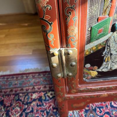 LOT #12 PAIR OF ANTIQUE RED LAQUER CABINETS WITH HIGHLY DECORATED PANELS