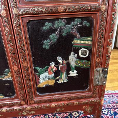 LOT #12 PAIR OF ANTIQUE RED LAQUER CABINETS WITH HIGHLY DECORATED PANELS