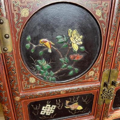 LOT #12 PAIR OF ANTIQUE RED LAQUER CABINETS WITH HIGHLY DECORATED PANELS