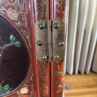LOT #12 PAIR OF ANTIQUE RED LAQUER CABINETS WITH HIGHLY DECORATED PANELS