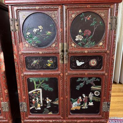 LOT #12 PAIR OF ANTIQUE RED LAQUER CABINETS WITH HIGHLY DECORATED PANELS