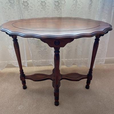 Vintage oval walnut table