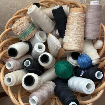 Large basket of sewing machine thread