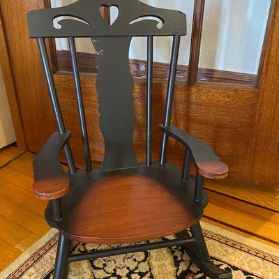 Lot of vintage baby clothes, baby shoes and toddler rocking chair