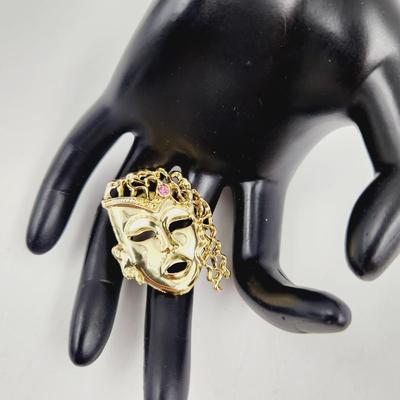 FANTASTIC GOLD TONED MASK PIN