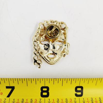 FANTASTIC GOLD TONED MASK PIN