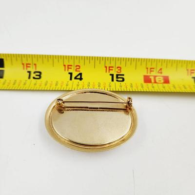 VINTAGE MOTHER OF PEARL GOLD TONED BROOCH