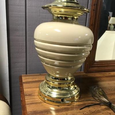 cream and gold-tone  lamp
