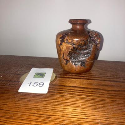 Large wood desk with a Burl wood vase