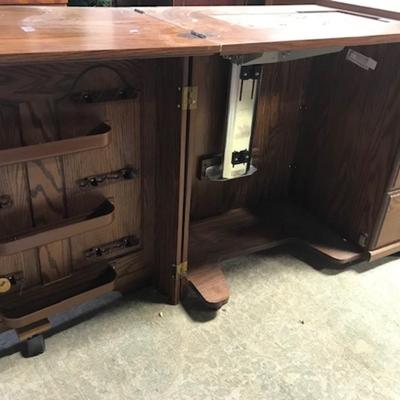 Sewing machine cabinet