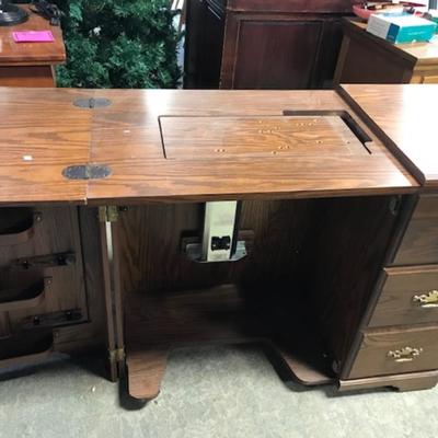 Sewing machine cabinet