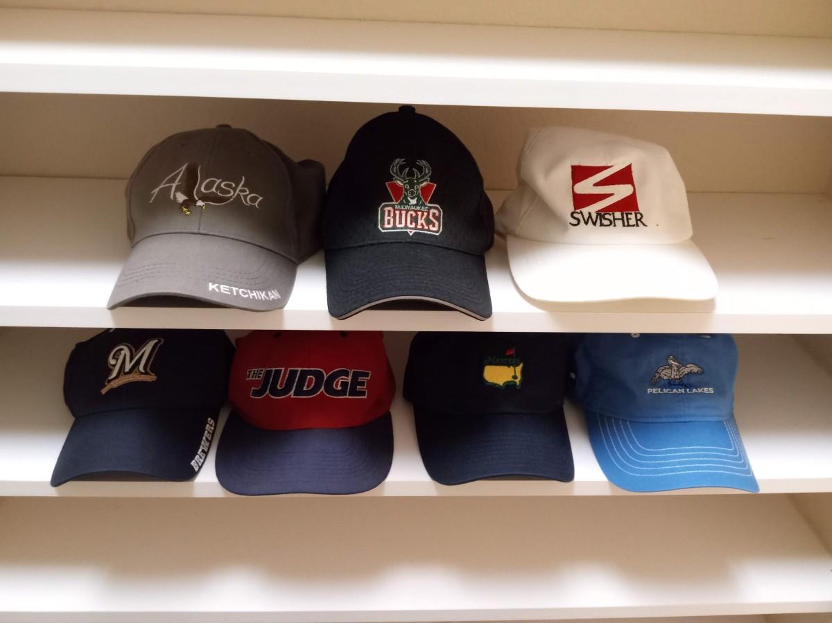 BASEBALL CAPS AND REUSABLE HAND WARMERS