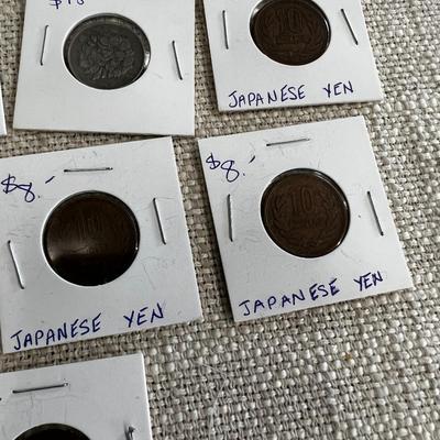 A Bunch (21)  of Japanese Yen in Coin Sleeves.