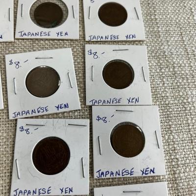 A Bunch (21)  of Japanese Yen in Coin Sleeves.