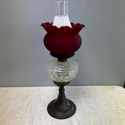 Antique Kerosene Lamp with Red Slip Shade