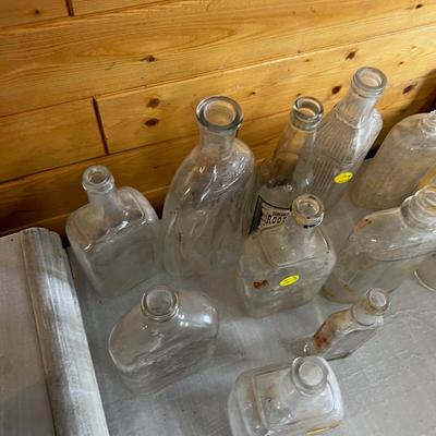 Collection of Clear Dump Mine Bottles 