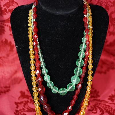 VINTAGE GLASS FACET CUT BEAD NECKLACES IN RED, GREEN AND AMBER COLORS