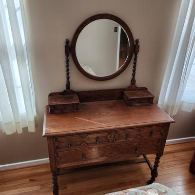 Antique Dresser with Round Beveled Mirror