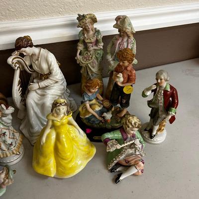 Ceramic and Resin Figurines of Mostly Women 