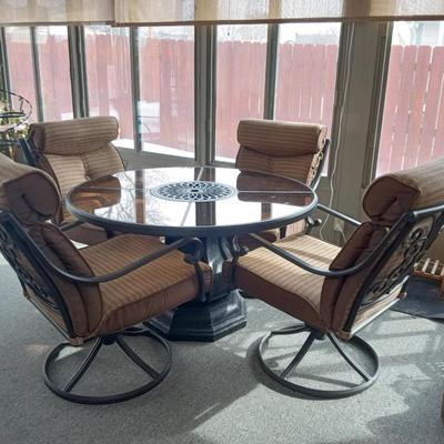 PATIO TABLE WITH PLUSH CUSHIONED CHAIRS